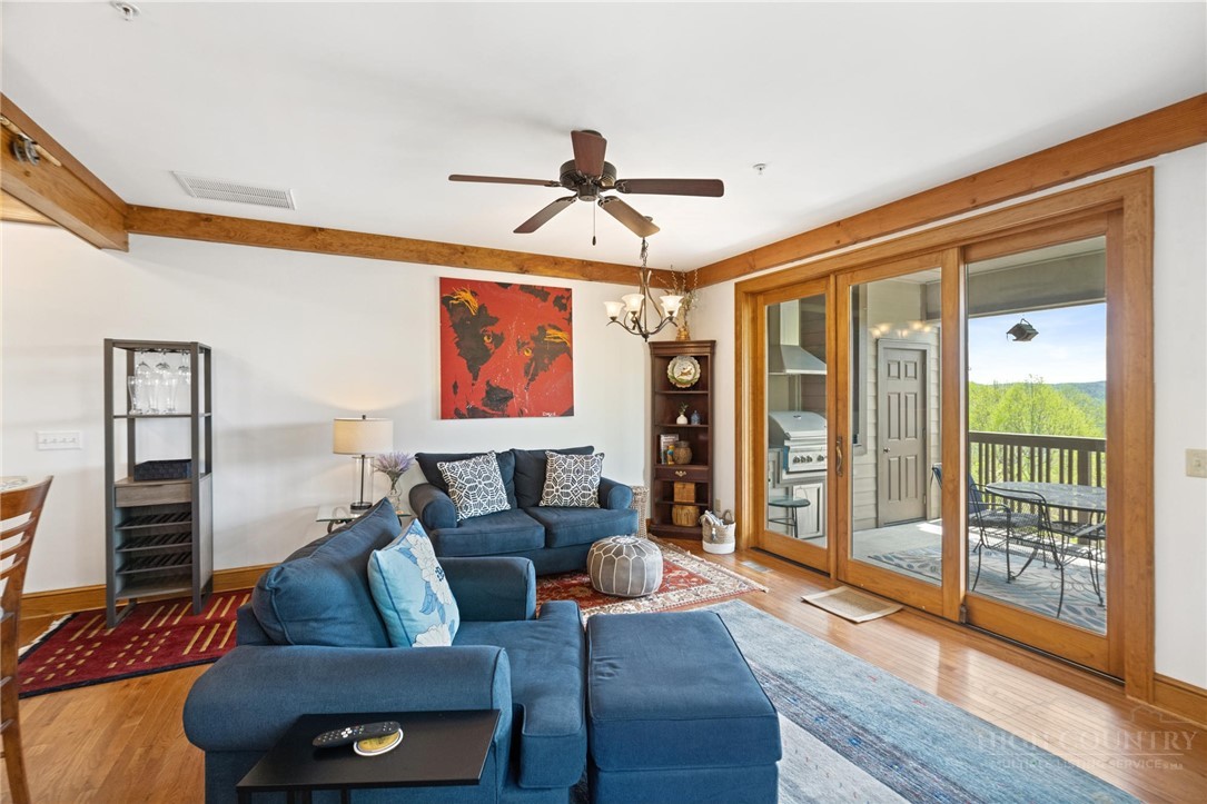 142 Evening View Lane, Unit CA4 Boone, NC 28607 - Photo 12 of 36 a living room with furniture and a ceiling fan
