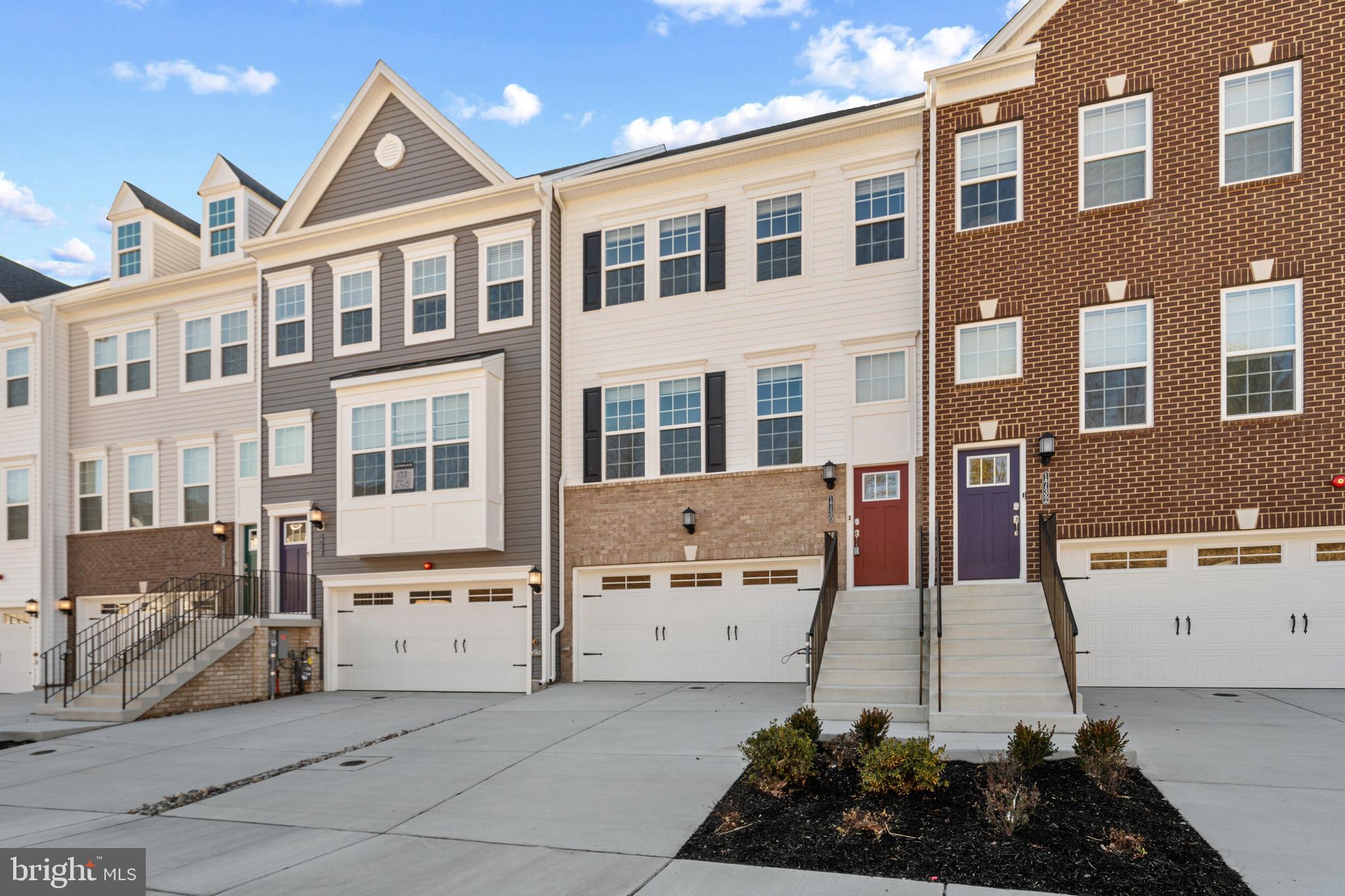1730 Water Xing Road Baltimore, MD 21208 - Photo 2 of 33 a front view of a building with many windows