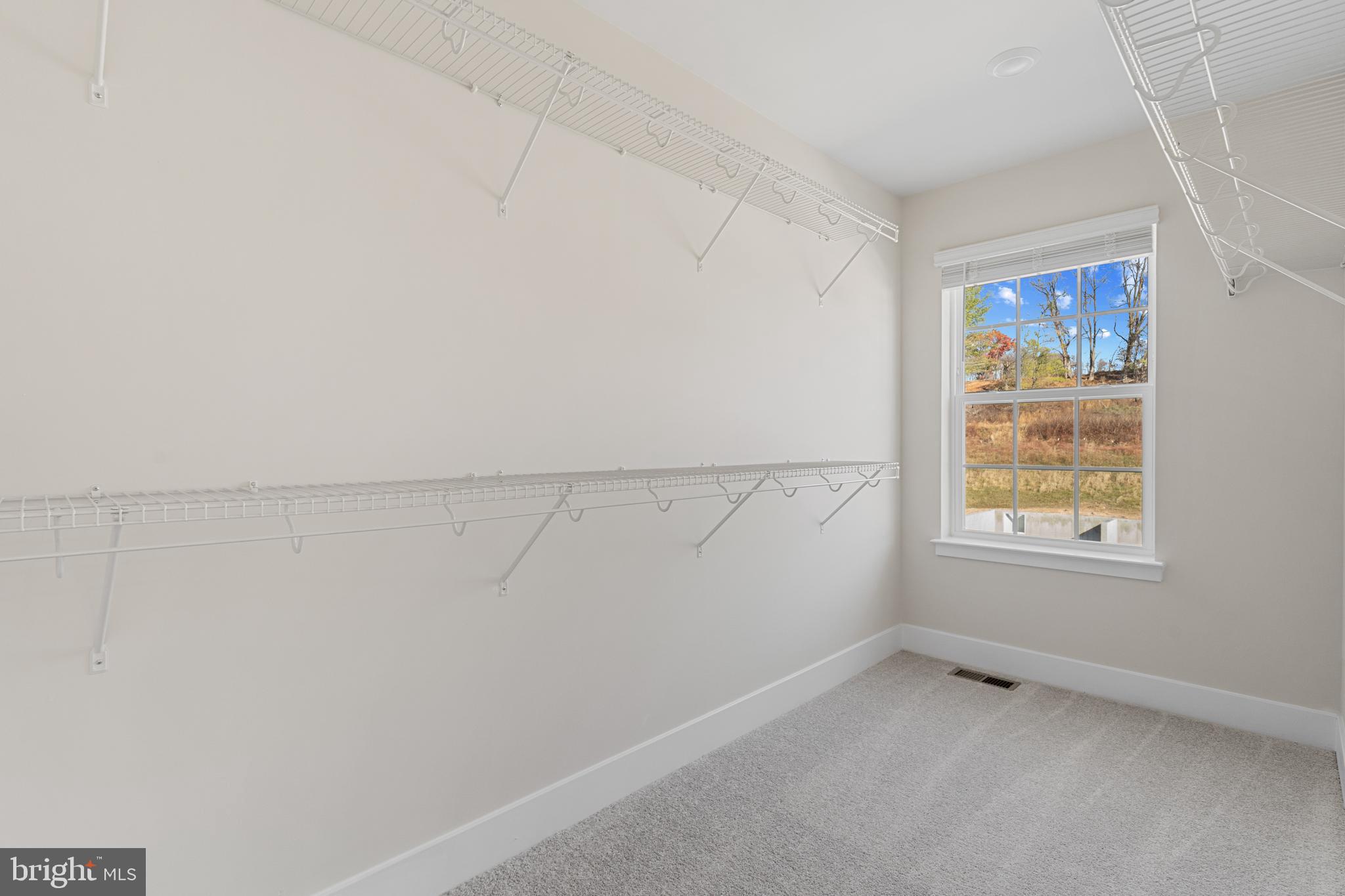 1730 Water Xing Road Baltimore, MD 21208 - Photo 22 of 33 Master Bedroom Walk in closet