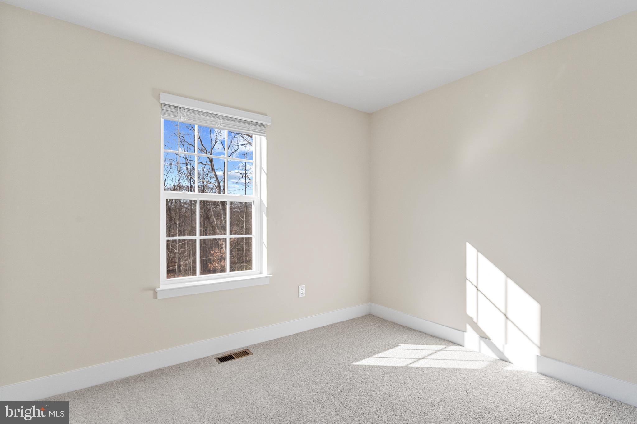 1730 Water Xing Road Baltimore, MD 21208 - Photo 27 of 33 an empty room with a window