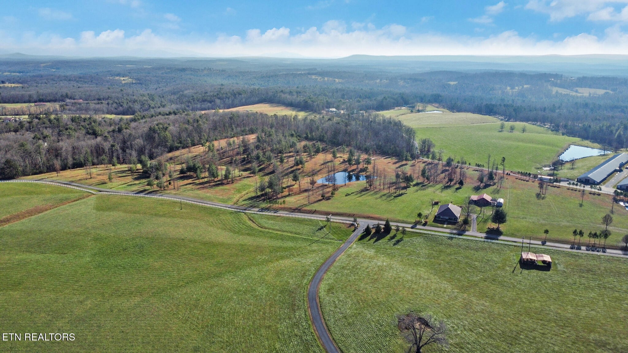 1275 Twin Bridge Road Deer Lodge, TN 37726 - Photo 11 of 47 an aerial view of a house with a yard