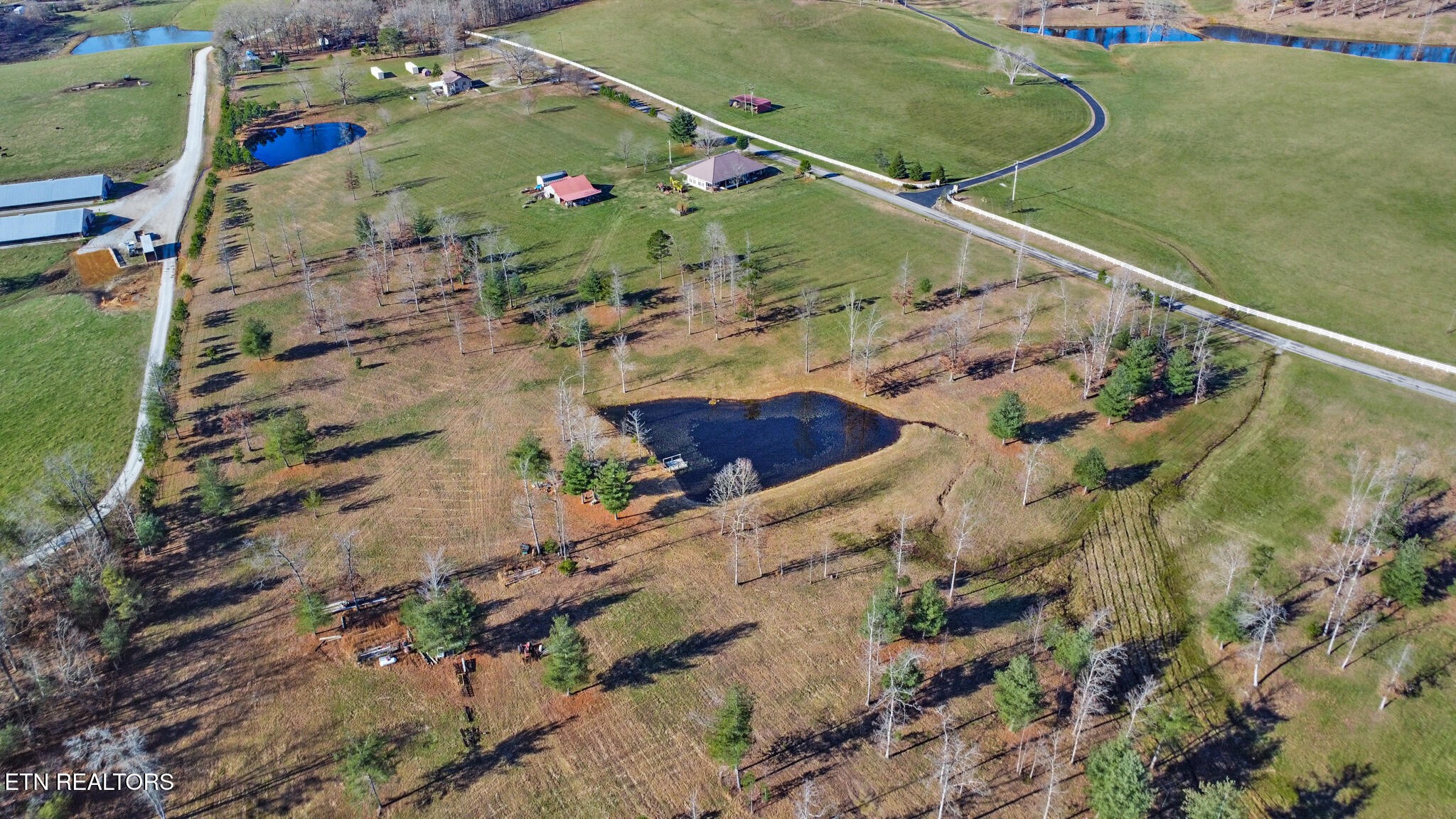 1275 Twin Bridge Road Deer Lodge, TN 37726 - Photo 16 of 47 an aerial view of a house with a yard