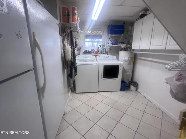 a bathroom with a sink toilet and mirror