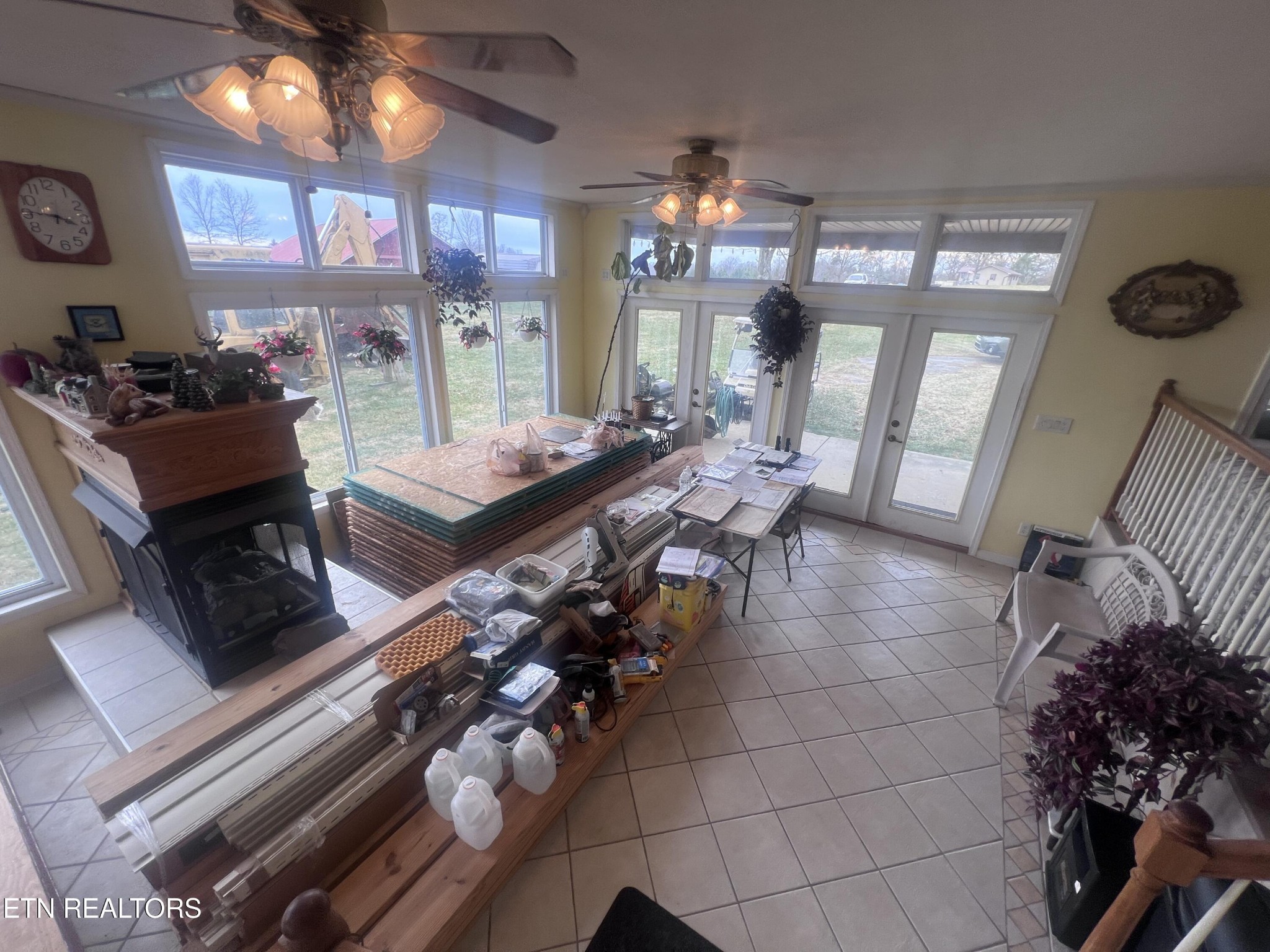 1275 Twin Bridge Road Deer Lodge, TN 37726 - Photo 34 of 47 a living room with furniture and a chandelier