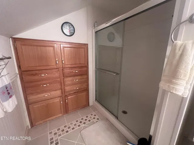 a view of outdoor space with swimming pool and trees