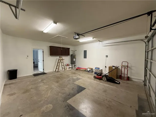a view of a patio with table and chairs and potted plants