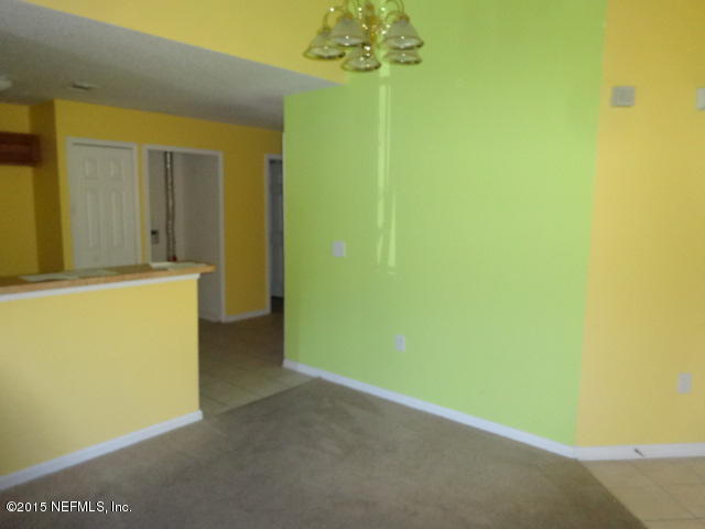 7920 Merrill Road, Unit 1013 Jacksonville, FL 32277 - Photo 4 of 11 a view of a room with a empty space