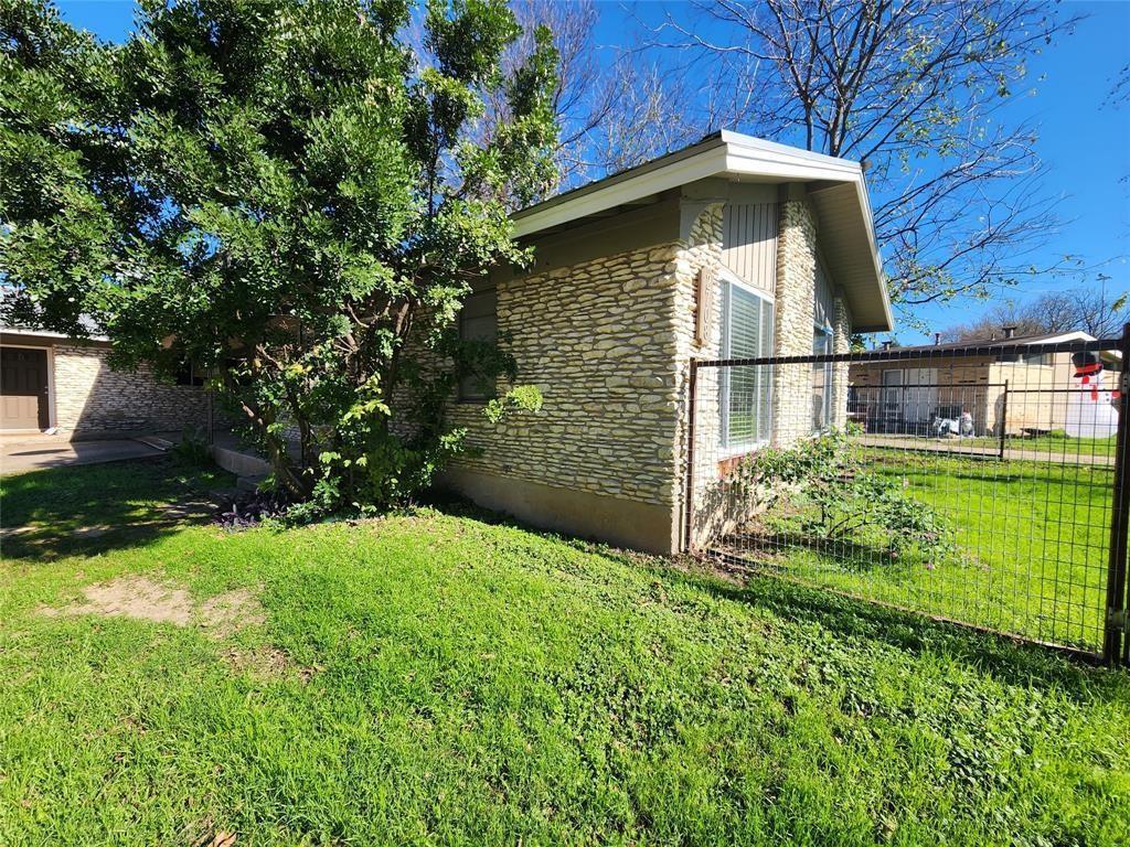 2708 St Edwards Circle, Unit A Austin, TX 78704 - Photo 13 of 13 View of side of home featuring stone siding