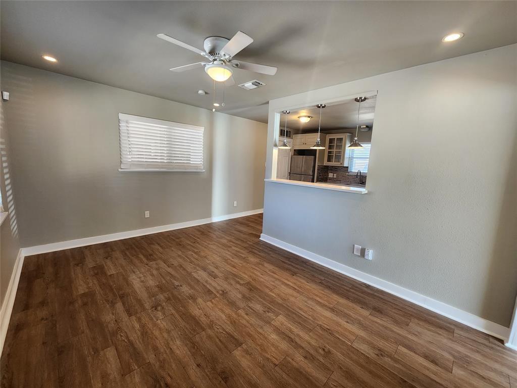 2708 St Edwards Circle, Unit A Austin, TX 78704 - Photo 2 of 13 Empty room with recessed lighting, ceiling fan, and dark wood finished floors