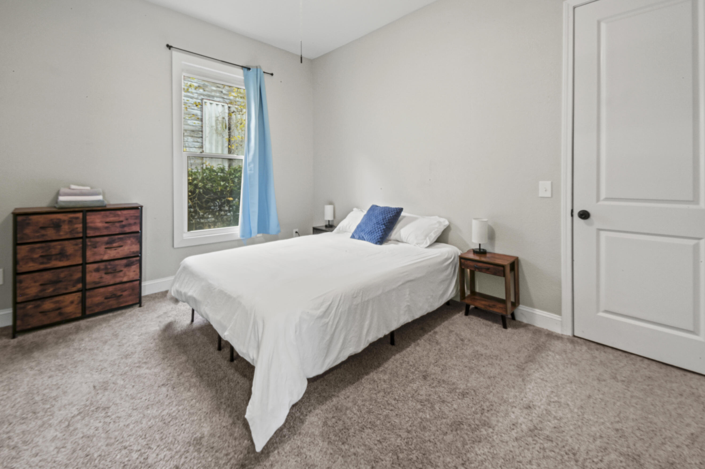 23 East Brainerd Street Pensacola, FL 32501 - Photo 15 of 25 a bedroom with a bed and a window