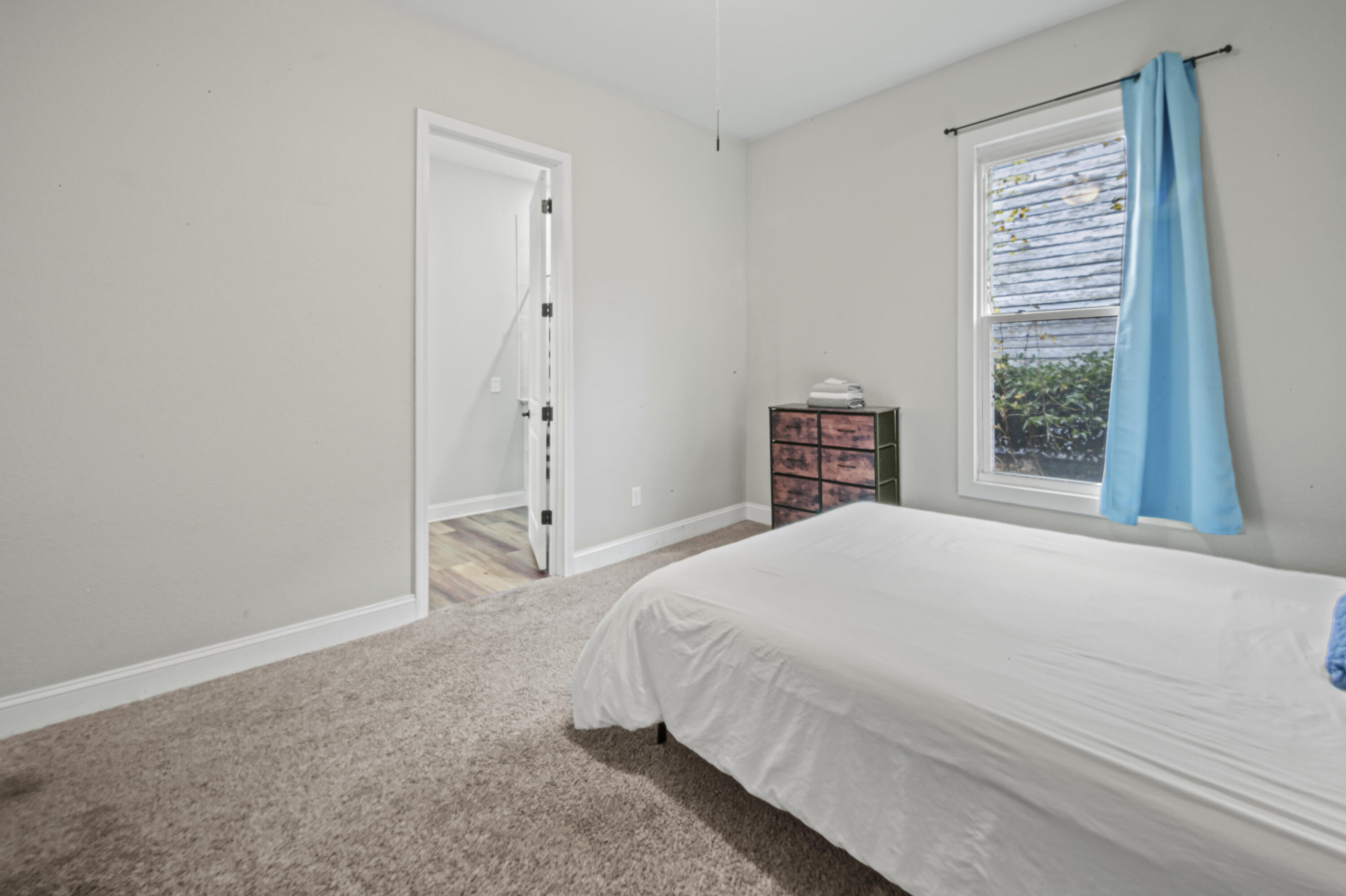 23 East Brainerd Street Pensacola, FL 32501 - Photo 16 of 25 a bedroom with a bed and a window
