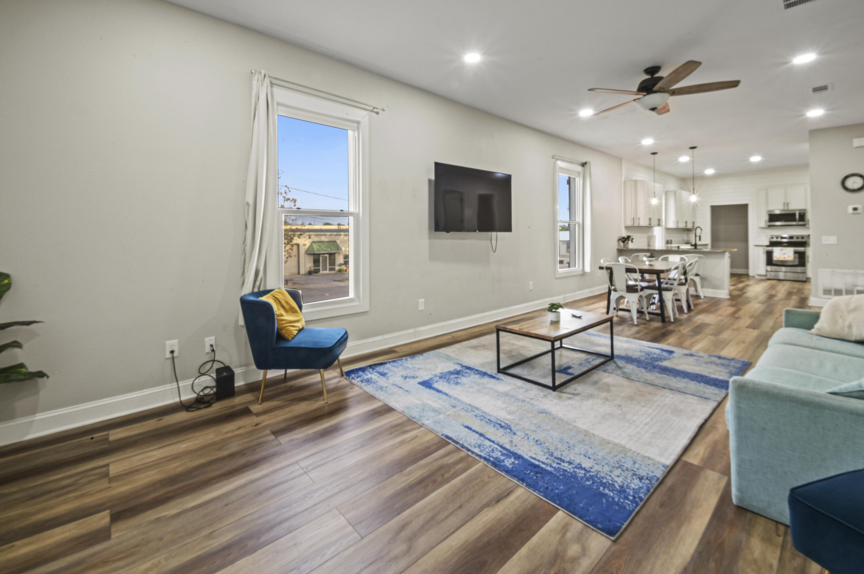 23 East Brainerd Street Pensacola, FL 32501 - Photo 5 of 25 a living room with furniture and a rug