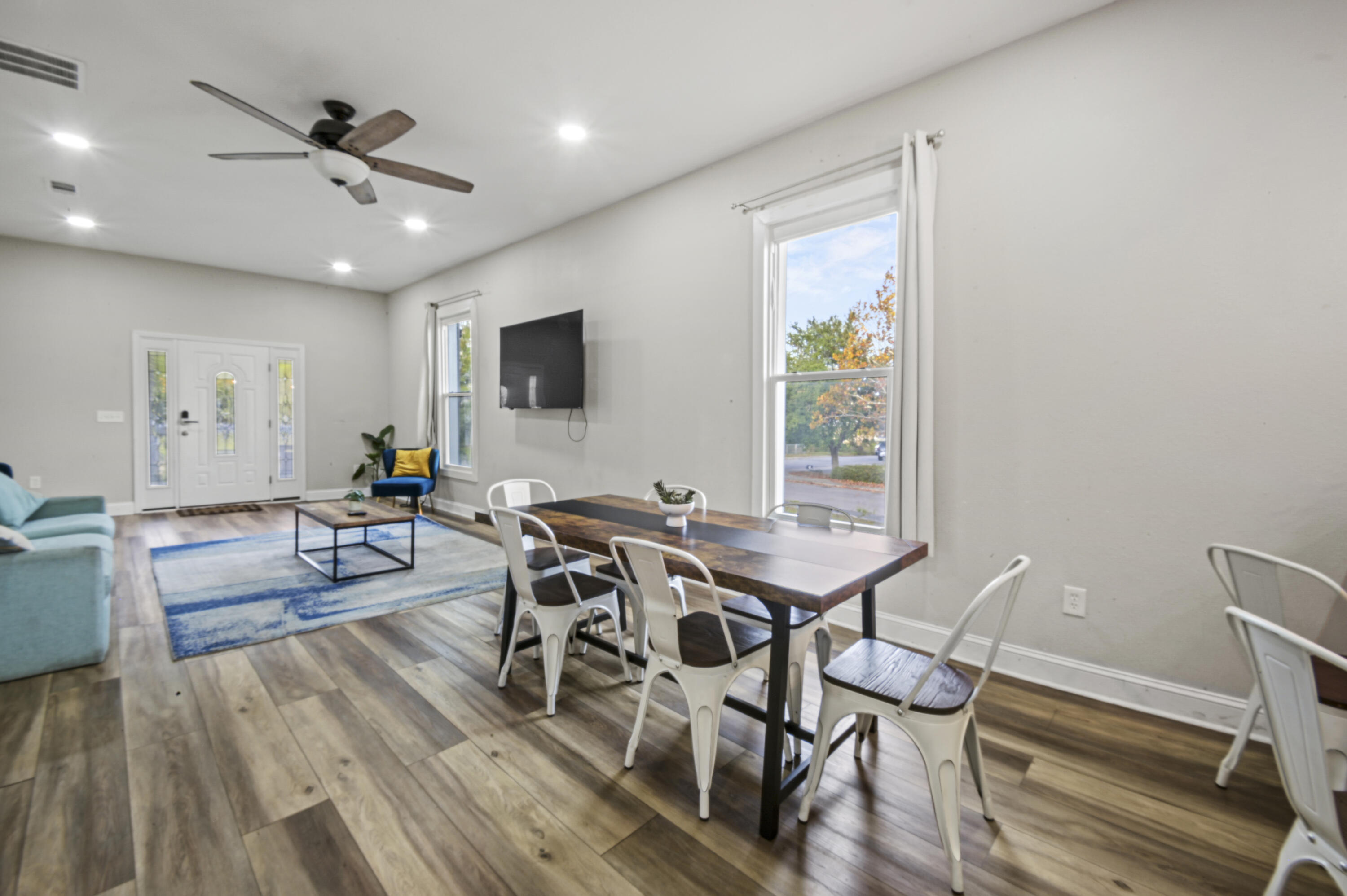 23 East Brainerd Street Pensacola, FL 32501 - Photo 6 of 25 a view of a dining room with furniture window and wooden floor