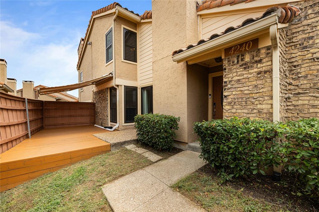 4240 Madera Road, Unit 4 Irving, TX 75038 - Photo 19 of 29 Your private yard and deck area with shade.