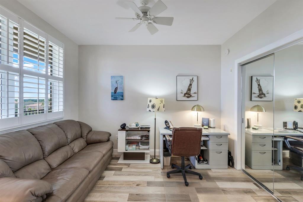 3313 Sunset Key Circle, Unit 404 Punta Gorda, FL 33955 - Photo 13 of 49 a living room with furniture