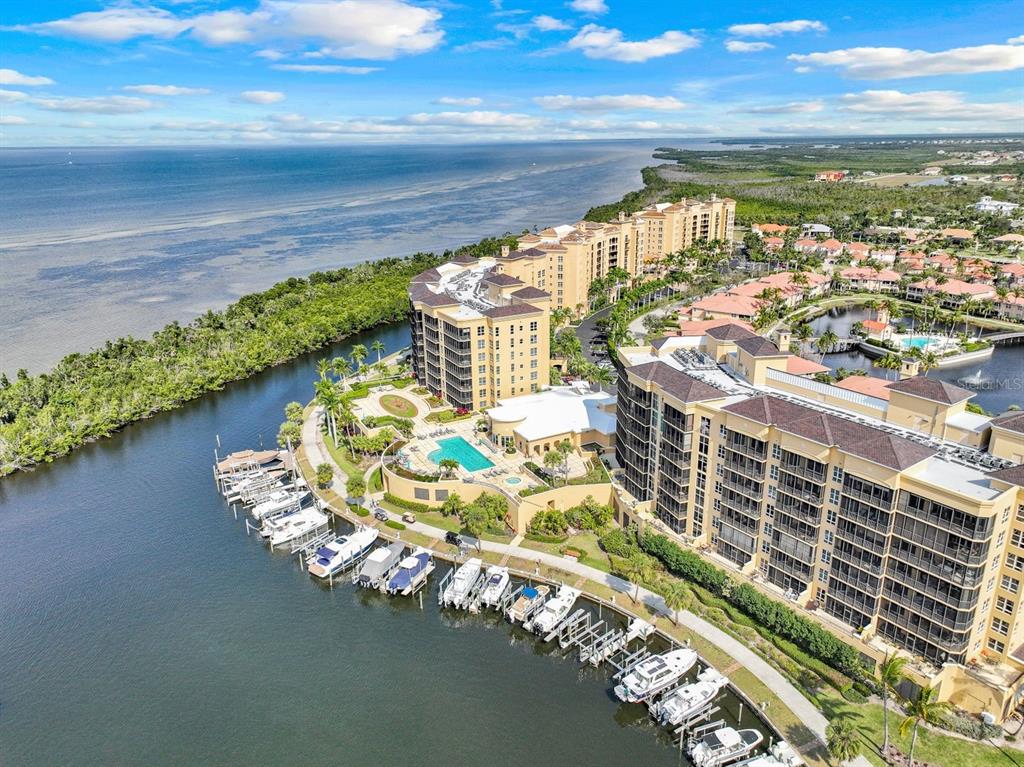 3313 Sunset Key Circle, Unit 404 Punta Gorda, FL 33955 - Photo 28 of 49 a view of a lake with a nearby beach