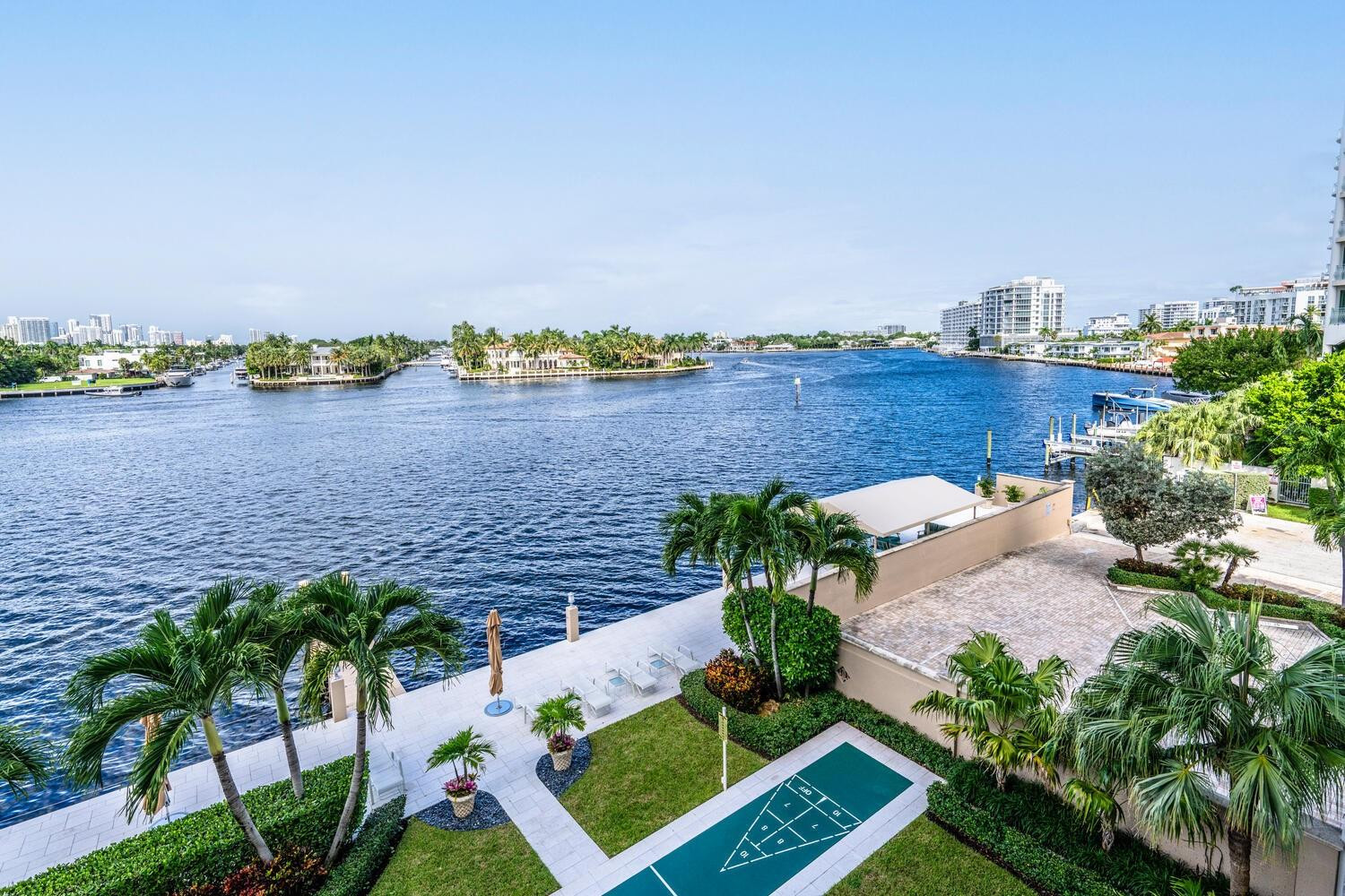 215 North Birch Road, Unit 4C Fort Lauderdale, FL 33304 - Photo 1 of 32 an aerial view of a house with a lake view