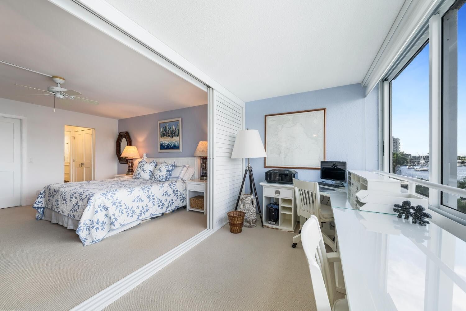 215 North Birch Road, Unit 4C Fort Lauderdale, FL 33304 - Photo 21 of 32 a bedroom with furniture and a large window