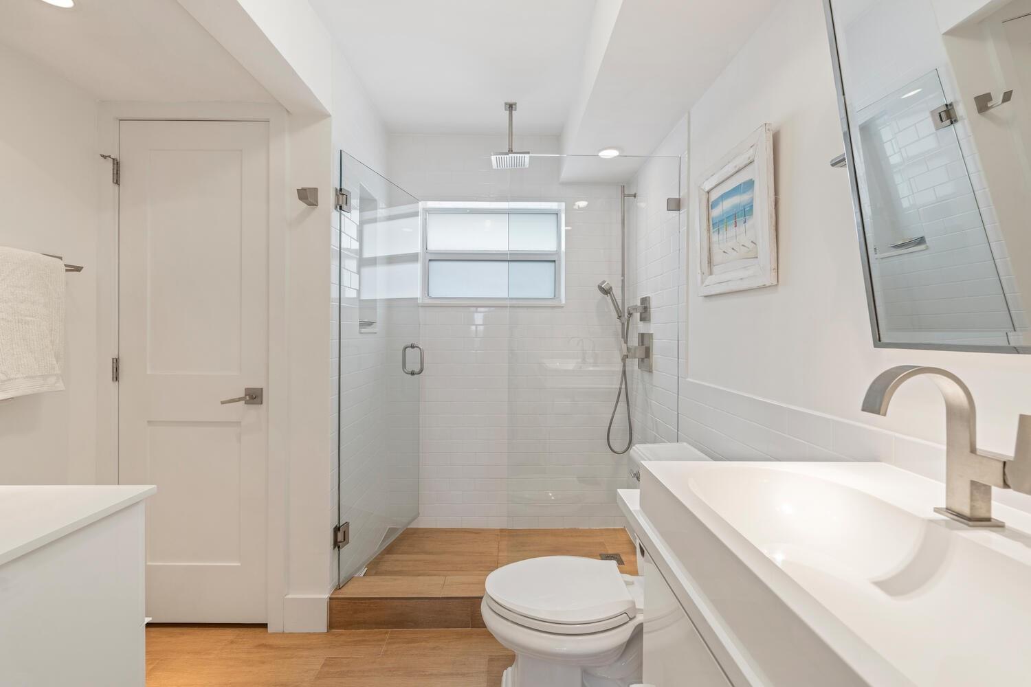 215 North Birch Road, Unit 4C Fort Lauderdale, FL 33304 - Photo 22 of 32 a bathroom with a sink a toilet and shower