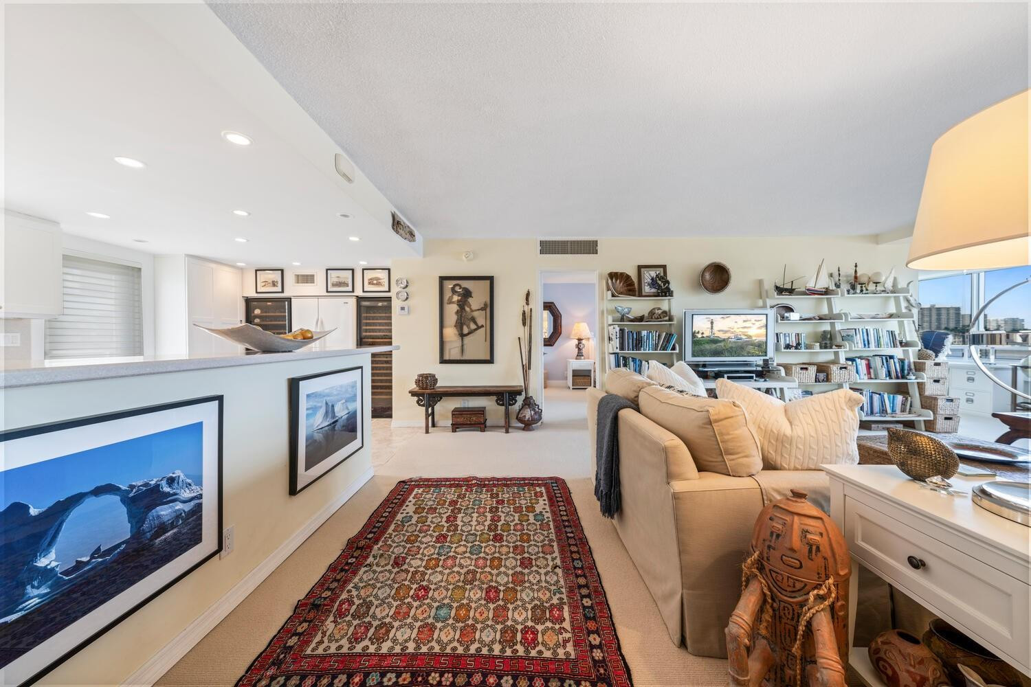 215 North Birch Road, Unit 4C Fort Lauderdale, FL 33304 - Photo 8 of 32 a living room with furniture and a fireplace
