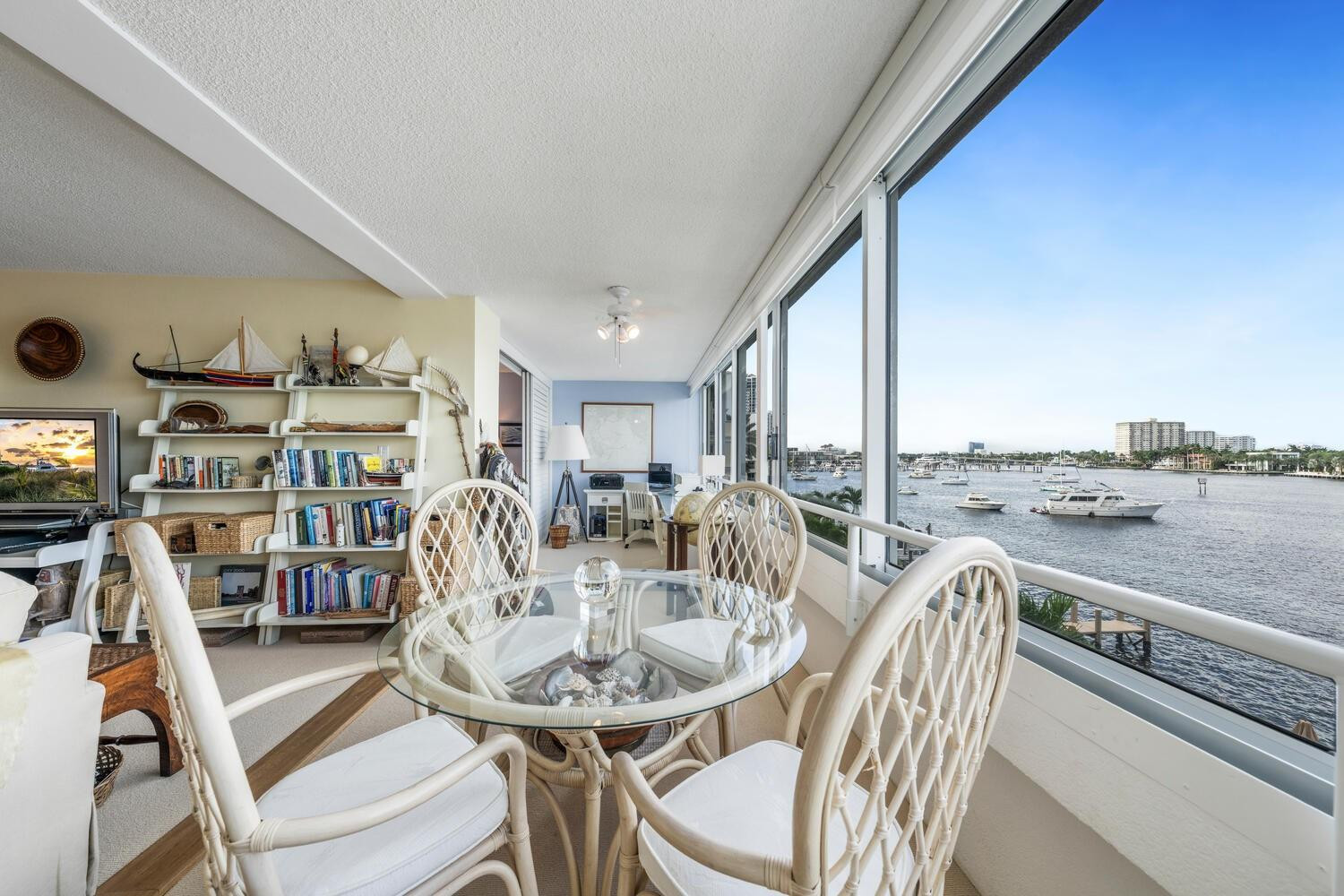 215 North Birch Road, Unit 4C Fort Lauderdale, FL 33304 - Photo 10 of 32 a view of a dining room with furniture window and wooden floor