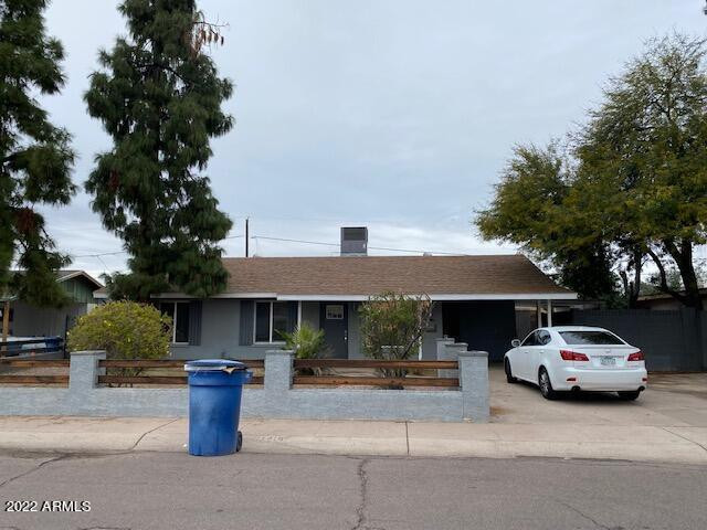1416 East Del Rio Drive Tempe, AZ 85282 - Photo 7 of 27 a couple of cars parked in front of a house