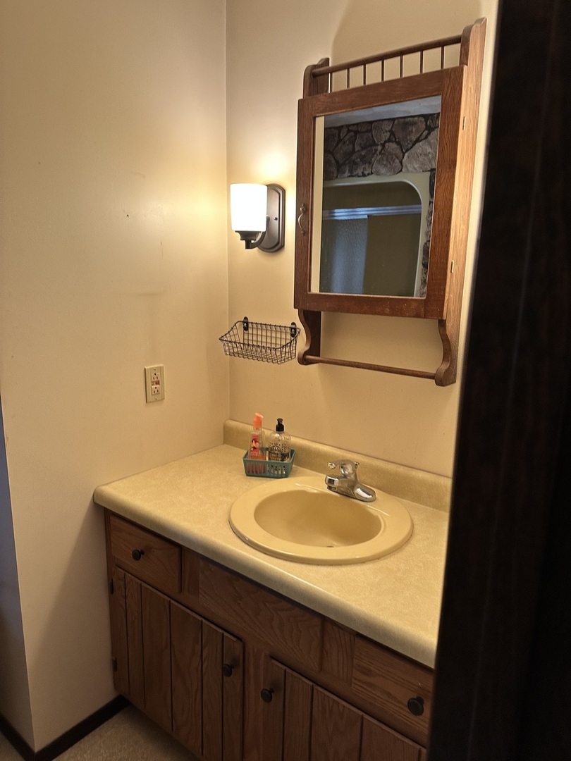 2191 Harvey Road Albany, IL 61230 - Photo 15 of 52 a bathroom with a sink and a mirror