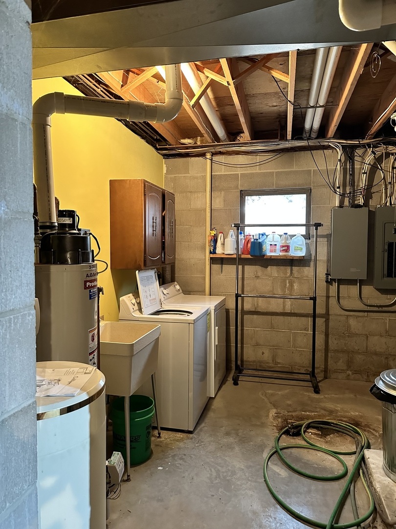 2191 Harvey Road Albany, IL 61230 - Photo 26 of 52 a room with storage and utility