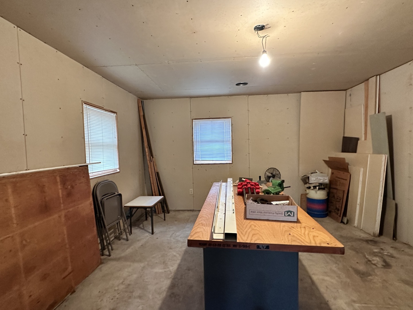 2191 Harvey Road Albany, IL 61230 - Photo 49 of 52 a room with furniture and a flat screen tv
