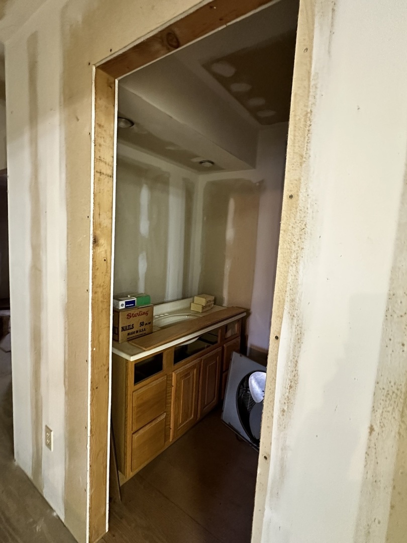 2191 Harvey Road Albany, IL 61230 - Photo 52 of 52 a kitchen with a stove and a refrigerator