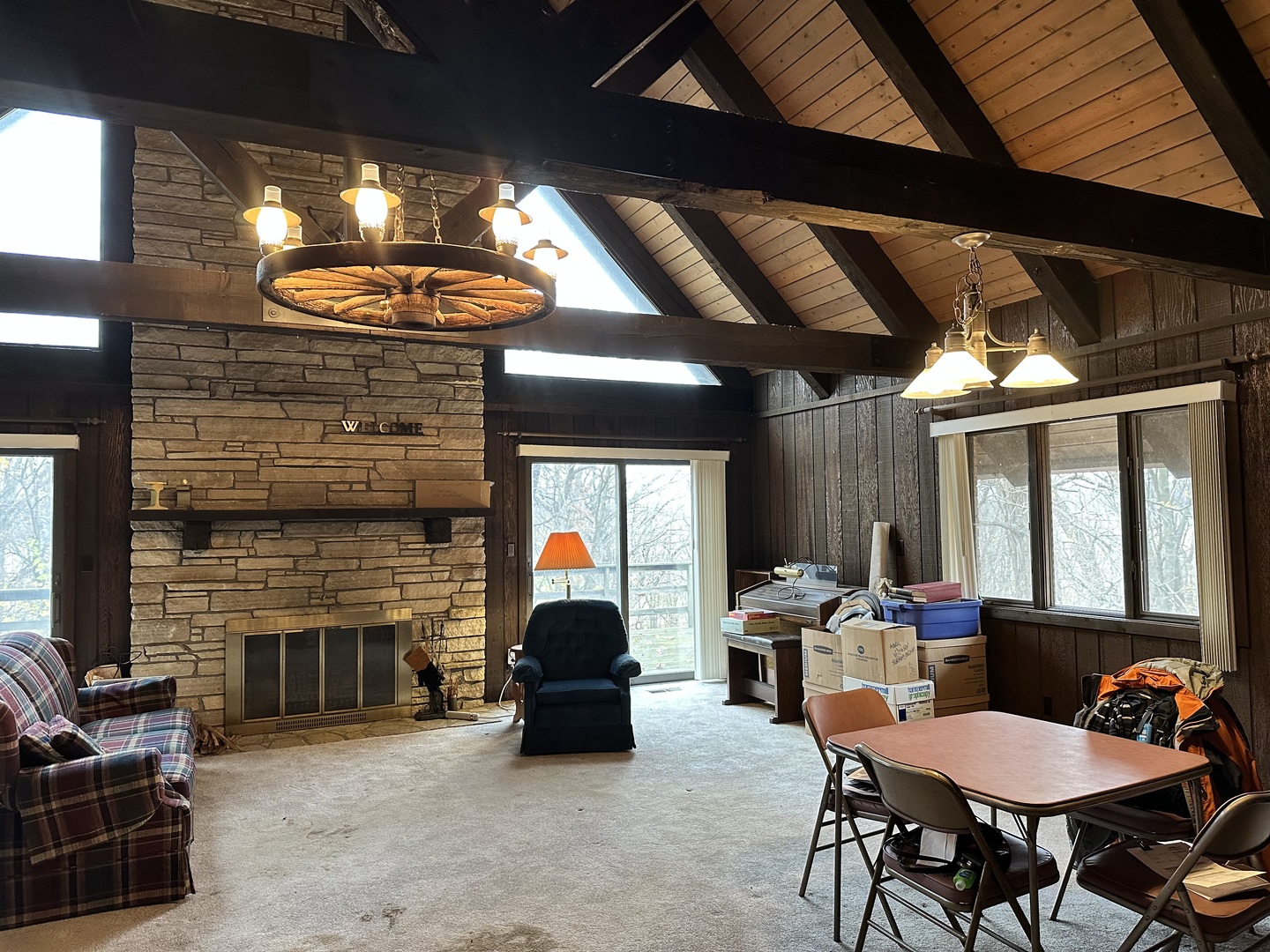 2191 Harvey Road Albany, IL 61230 - Photo 9 of 52 a living room with furniture a fireplace and a dining table