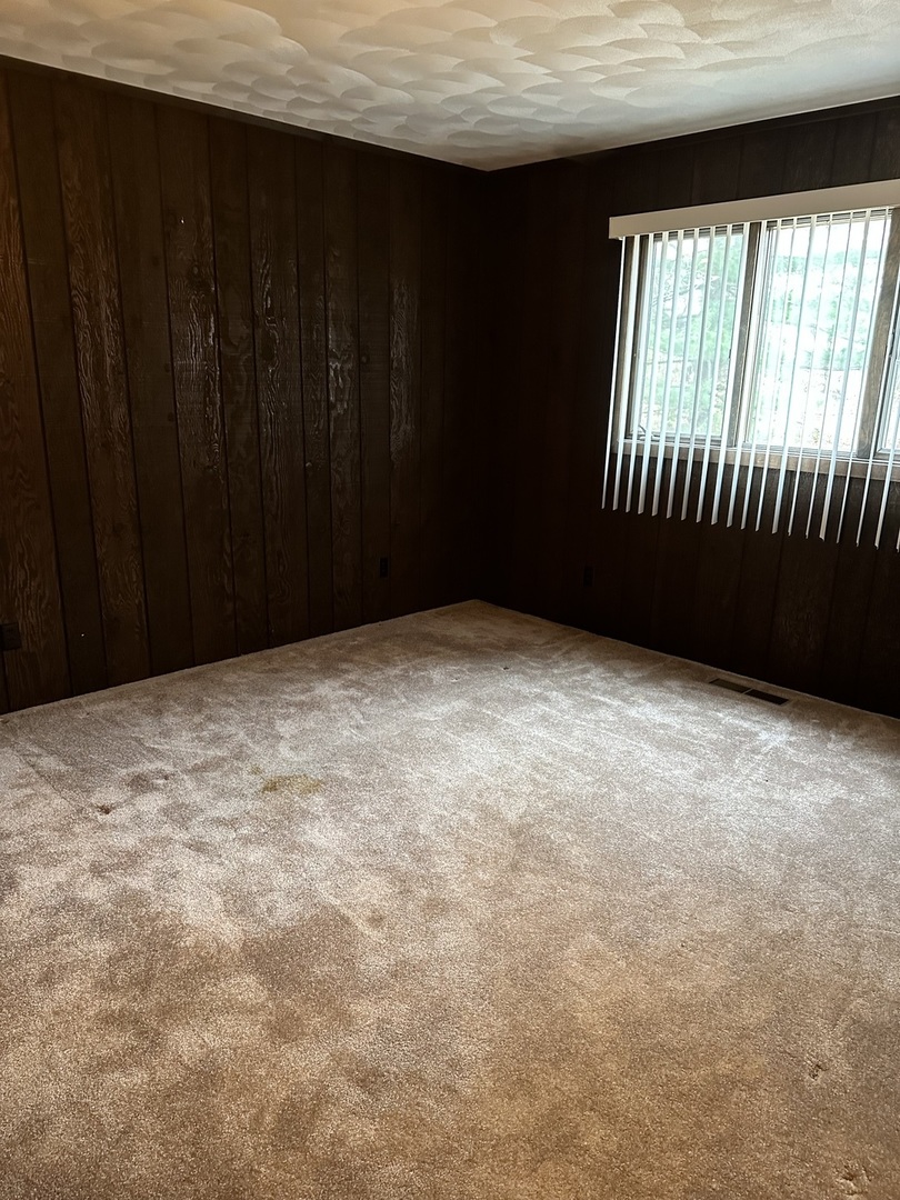 2191 Harvey Road Albany, IL 61230 - Photo 10 of 52 a view of an empty room with balcony
