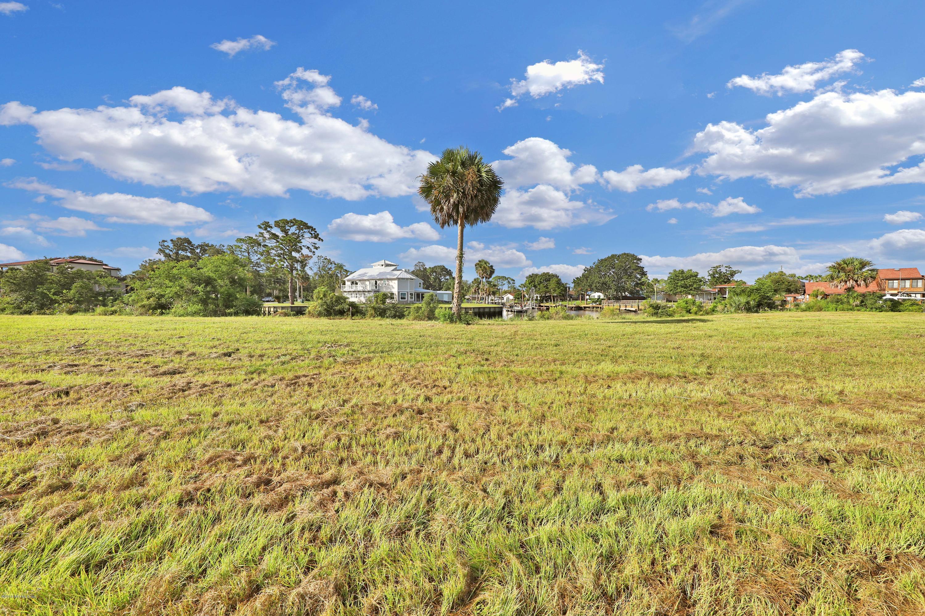 L3 Stacey Road Jacksonville, FL 32250 - Photo 1 of 6 a view of a big yard with table & chairs