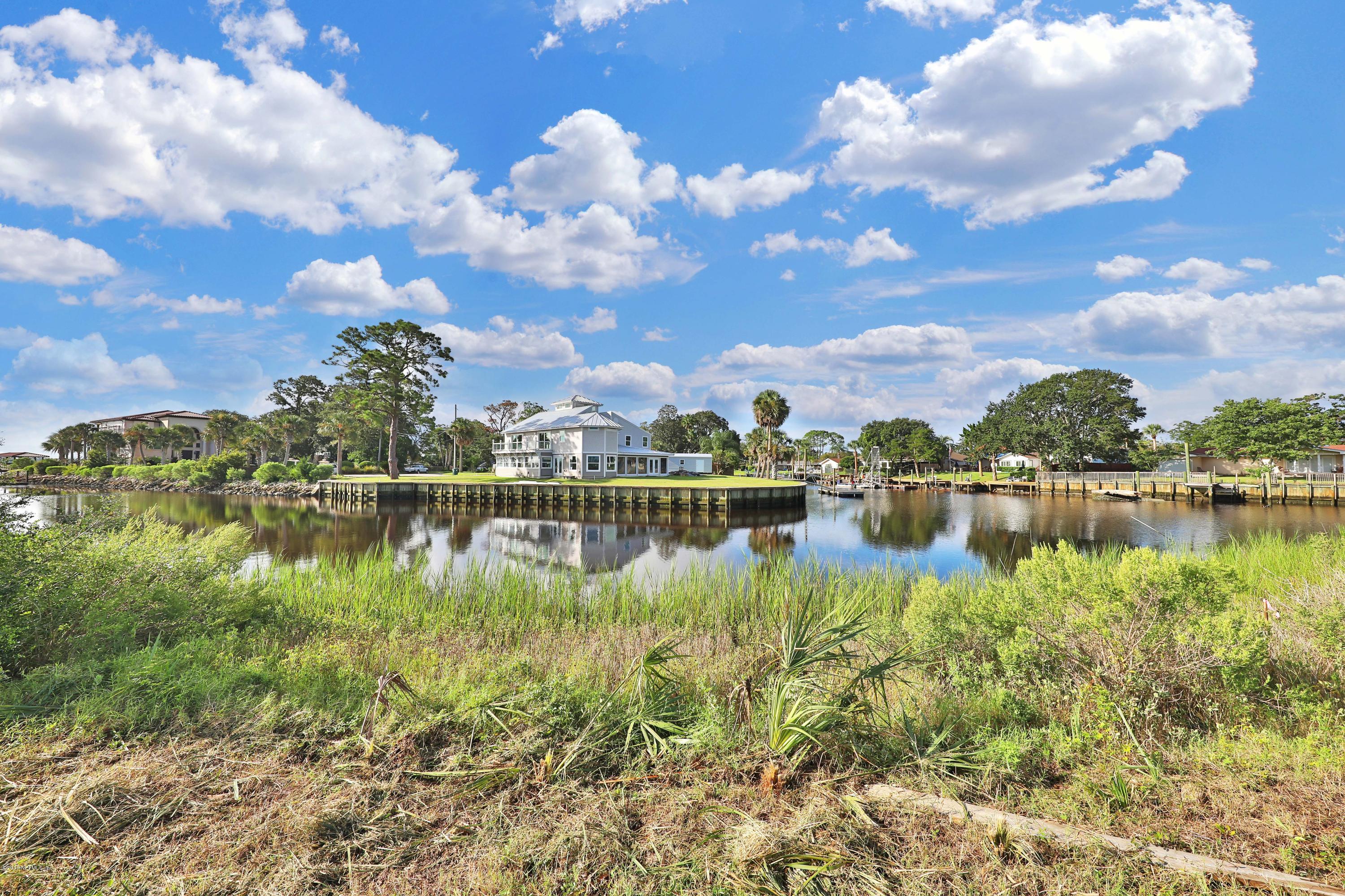 L3 Stacey Road Jacksonville, FL 32250 - Photo 3 of 6 a view of a lake with houses