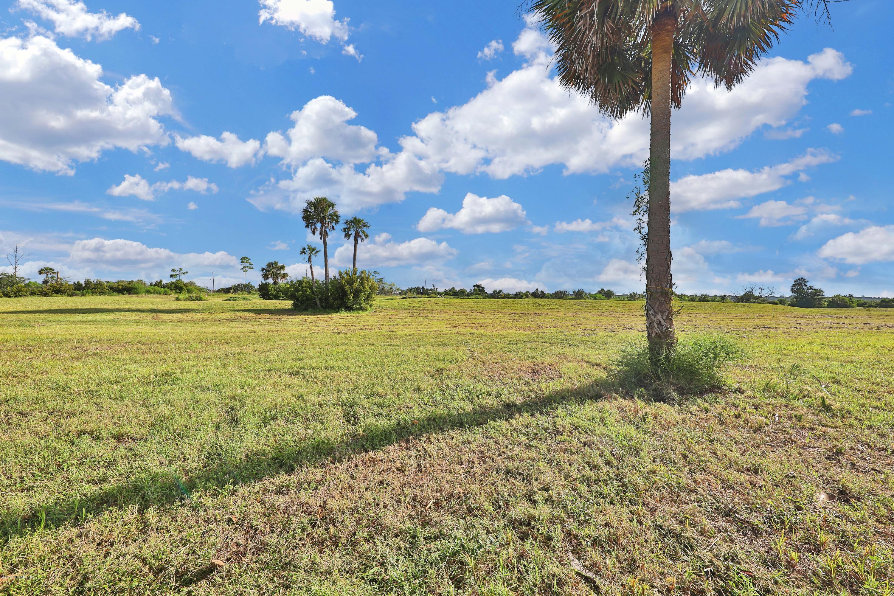L3 Stacey Road Jacksonville, FL 32250 - Photo 4 of 6 a view of a lake with a yard