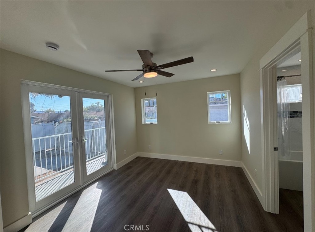 1319 Amapola Avenue Torrance, CA 90501 - Photo 11 of 17 a view of wooden floor and a chandelier fan in a room