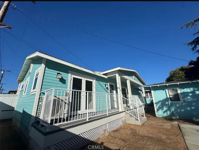 a front view of a house with balcony