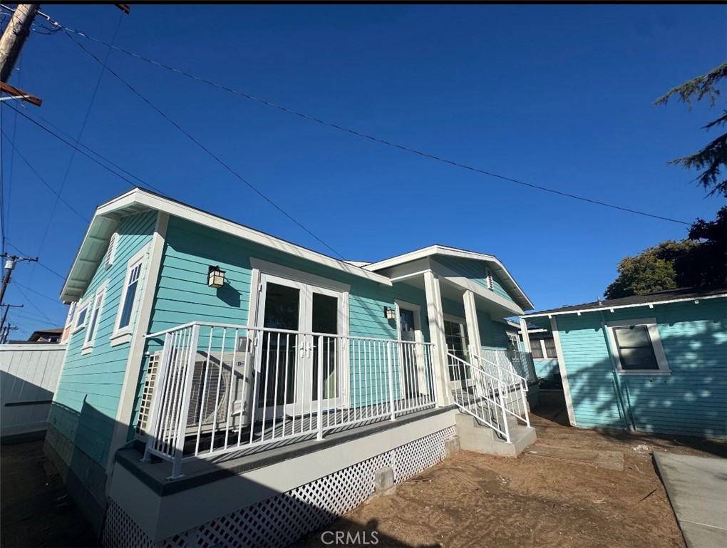 1319 Amapola Avenue Torrance, CA 90501 - Photo 3 of 17 a front view of a house with balcony