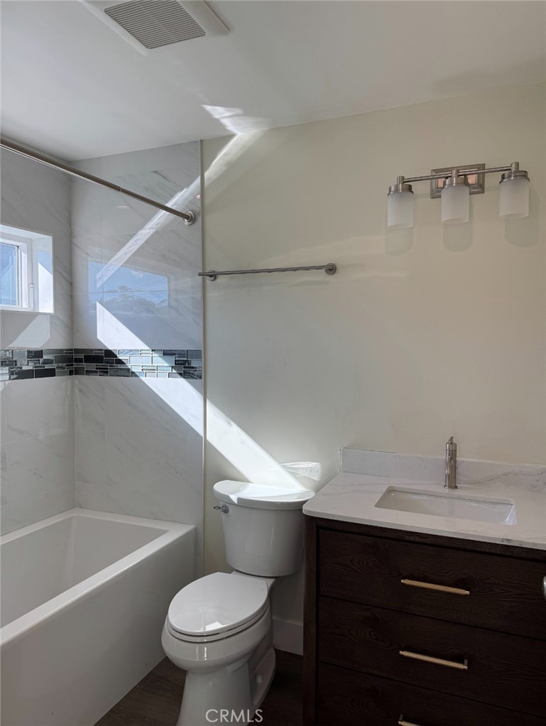 1319 Amapola Avenue Torrance, CA 90501 - Photo 10 of 17 a bathroom with a sink a toilet and a bathtub