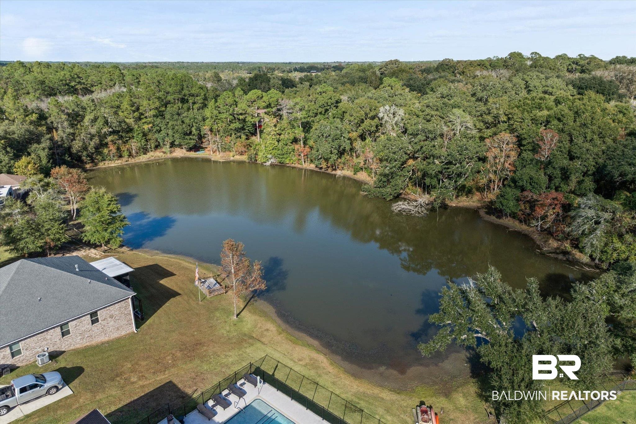 0 Acorn Way Grand Bay, AL 36541 - Photo 17 of 17 Aerial view of a large body of water and a forest