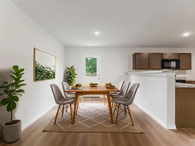 a outdoor living space with furniture and a flat screen tv