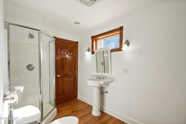 a bathroom with a sink and mirror