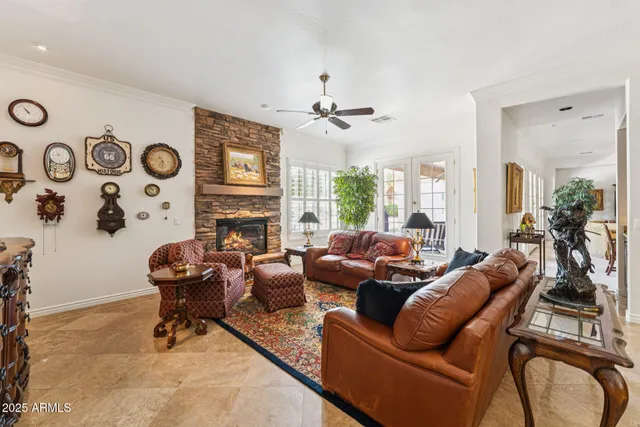 a living room with furniture and a table