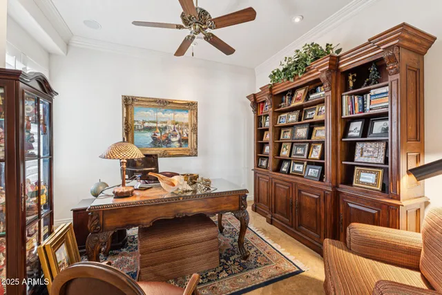 a view of a living room and workspace