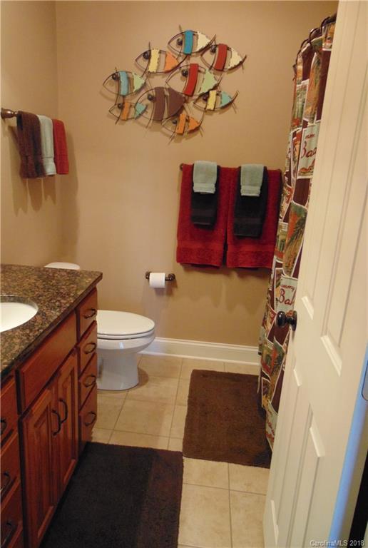 2010 Marina Pointe Road, Unit 2010 Salisbury, NC 28146 - Photo 22 of 28 a bathroom with a toilet and a sink