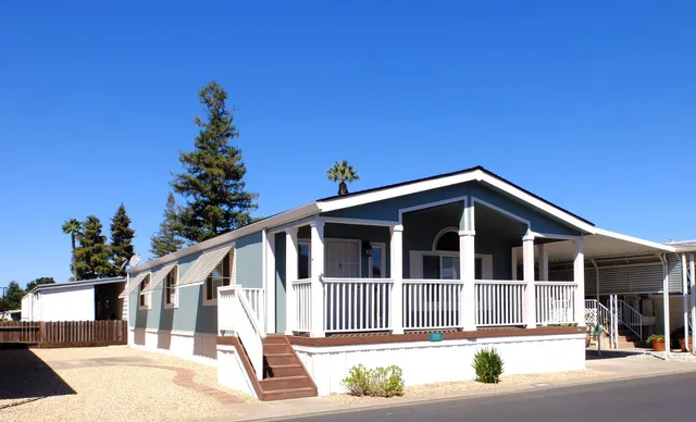a front view of a house with a porch