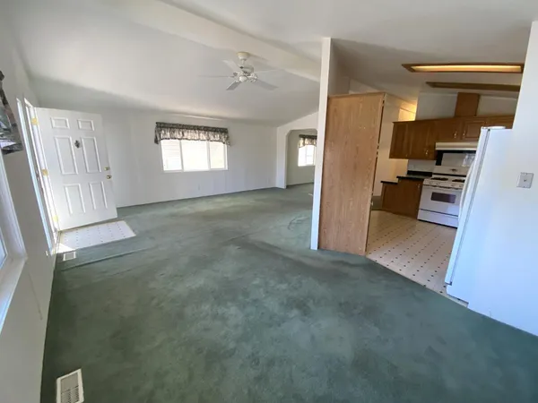a view of a livingroom with a furniture