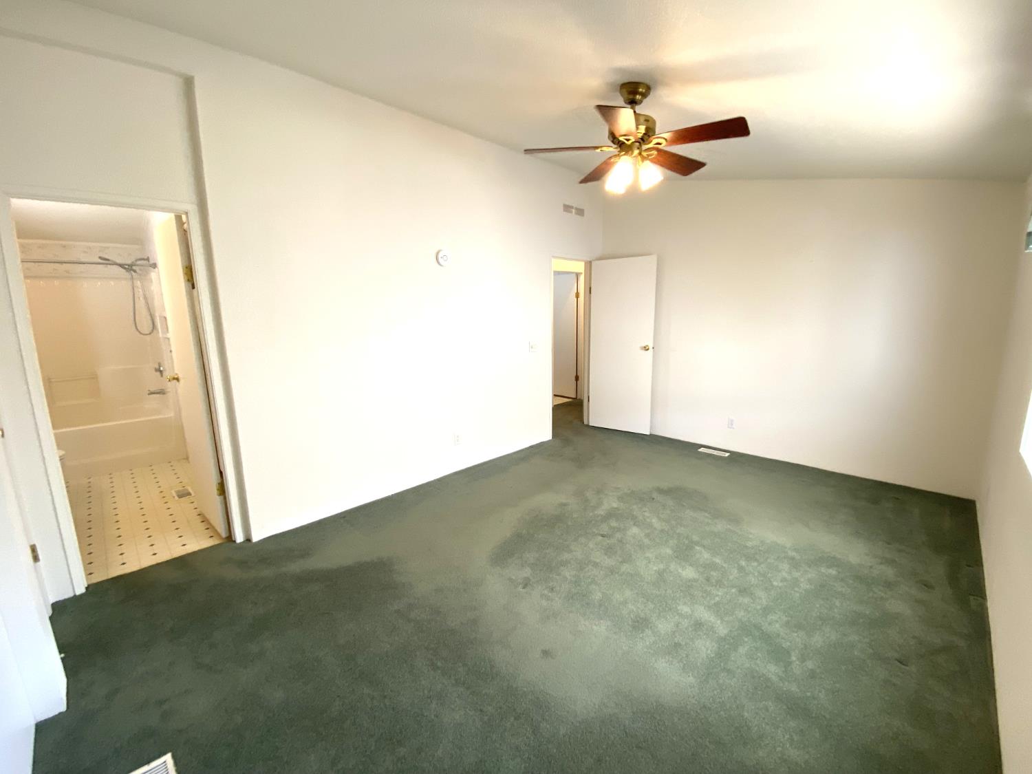 3901 Maui Terrace Modesto, CA 95355 - Photo 19 of 32 a view of a room with a ceiling fan
