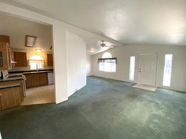 a view of a kitchen and a window