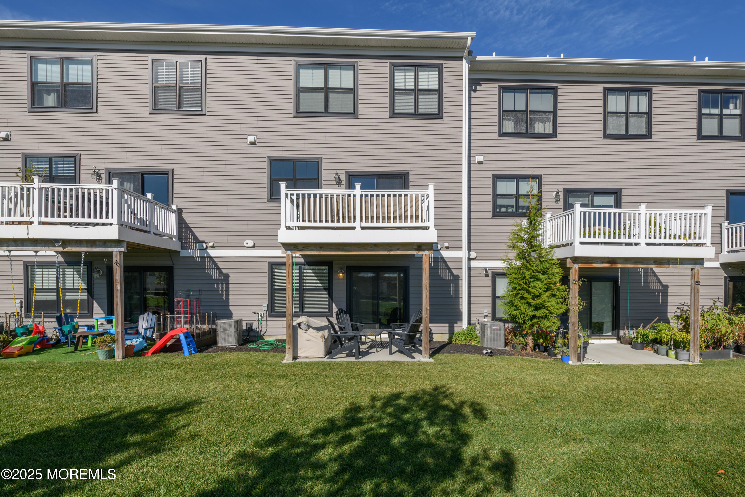 26 Kelly Way Tinton Falls, NJ 07724 - Photo 31 of 33 a view of a house with a yard and plants